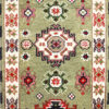 green Kazak hand-knotted rug