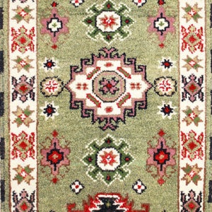 green Kazak hand-knotted rug
