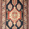 navy blue Kazak rug